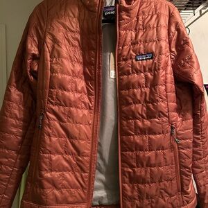 Patagonia Brown Puffer Jacket with Quilted Design and Full Zip Closure